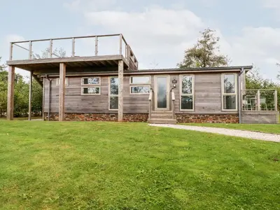 a house with a large yard in front of it at 1 Southern Place in Liskeard