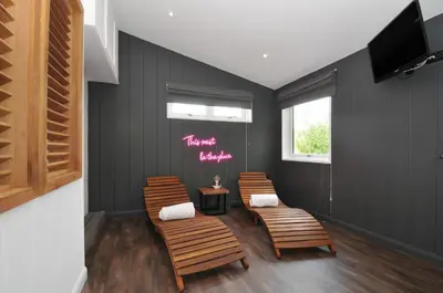 a room with four chairs and a sign that says home ballet at 24 Meadow Retreat in Liskeard