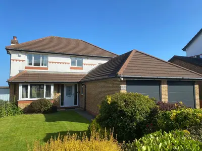 a house with a brown roof at No.48 Falmouth - 10 minutes walk to the beach in Falmouth