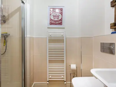 a bathroom with a shower and a toilet at Apartment The Saltings by Interhome in St Austell