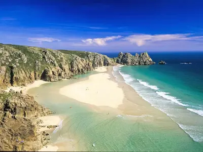 an aerial view of a beach with rocks and the ocean at Apartment The Saltings by Interhome in St Austell