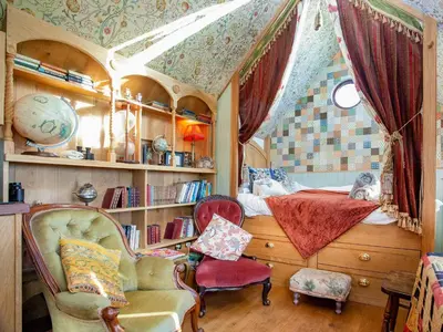 a room with a bed and a desk and chairs at The Observatory-Uk41754 in Lanreath