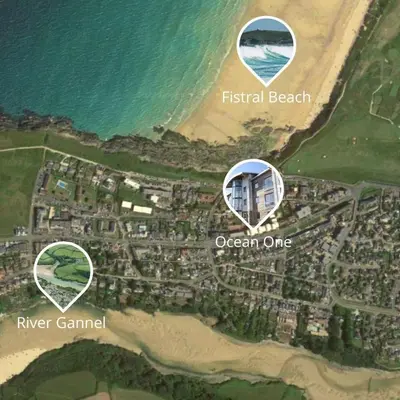 a map of a beach with two white circles at 33 Ocean one in Newquay