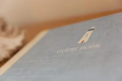 a book with the title of a guest book at Beach Haven in Carbis Bay