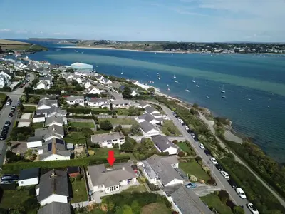 an aerial view of a town next to the water at 7 Porthilly View in Padstow
