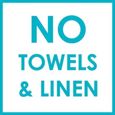 a sign with the words no towers and linear at Aeolian in Padstow