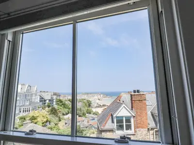 a window with a view of a city at St Ives View in St Ives