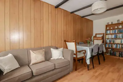 a living room with a couch and a table at Narnia in Delabole