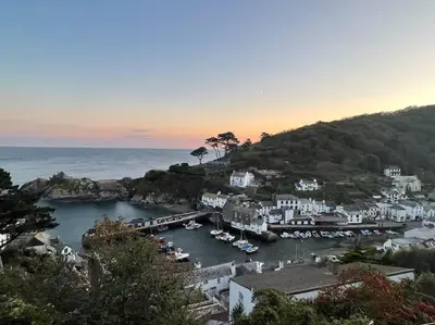 a view of a harbor with boats in the water at Fishermans Heights in Polperro