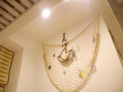 a large purse hanging on the wall of a room at Salty Sea Dog in Tintagel