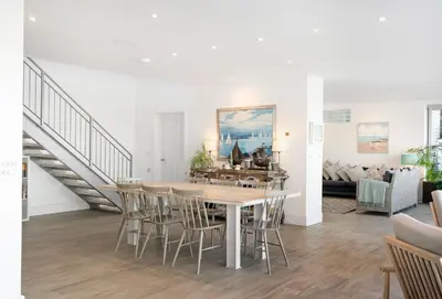 a dining room with a table and chairs at Shore Edge in Portreath