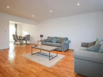 a living room with a couch and a coffee table at 6A The Mews in Padstow