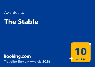 a yellow box with the text awarded to the stable at The Stable at Widemouth Bay - 2 bedroom cottage in Poundstock