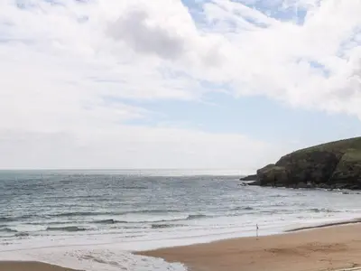 a view of the ocean from the beach at Godolphin Barn in Helston