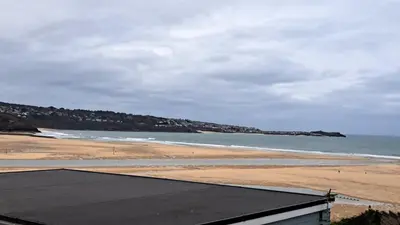 a view of a beach with the ocean at B37 Ebb Tide, Riviere Towans in Hayle