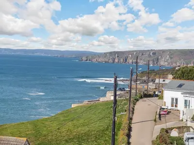 a view of the ocean from a house at Seascape in Porthleven