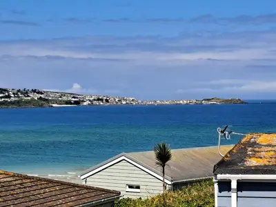 a house with a view of the ocean at B44 Sea Urchin, Riviere Towans in Hayle