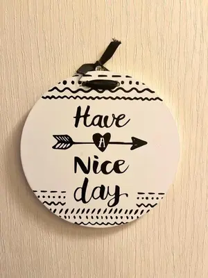 a sign that says have a nice day on a wall at Our Lodge at Newquay Bay NB35 in Newquay
