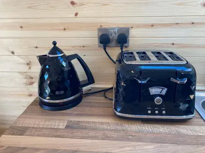 a toaster and a toaster sitting on a counter at Laity's Lodge in Penzance