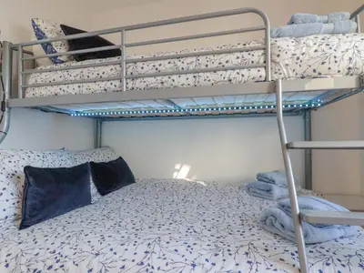a bunk bed in a room with a bunk bed gmaxwell gmaxwell gmaxwell at Sea View in Mevagissey