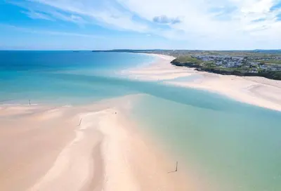 an aerial view of a beach with the ocean at Family friendly home by the beach in Hayle