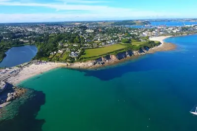an aerial view of a small island in the water at The Emslie Road Beach Flat in Falmouth