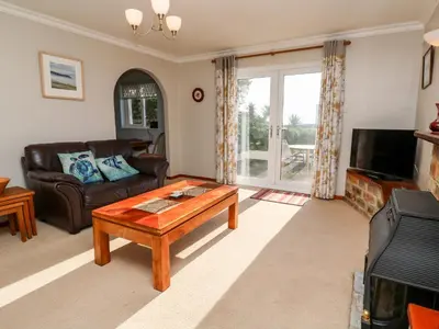 a living room with a couch and a coffee table at Salakee in Penzance