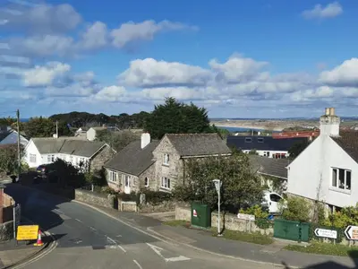 a view of a village with houses and a street at Seashells at 2 TRENCROM COURT ST IVES in Carbis Bay