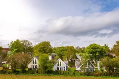 a row of houses in a residential neighborhood at Trewhiddle Retreat V21 by Together Travel - Luxury 3-Bedroom Villa in St Austell