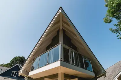 a house with a pyramid roof on top of it at Trewhiddle Retreat V10 by Together Travel - Luxury 4-Bedroom Villa in St Austell