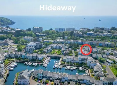 an aerial view of a harbor with boats in the water at Hideaway - Exclusive marina development, town centre, with parking in Falmouth