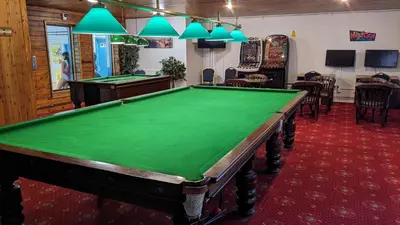 a pool table in a room with a pool table at 23 Trevithick Court, Tolroy Manor in Hayle