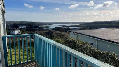 a view of a river from the balcony of a house at D39 St Margarets, Riviere Towans in Hayle