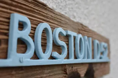 a sign on the side of a building that says abounding at D52 Boston, Riviere Towans in Hayle