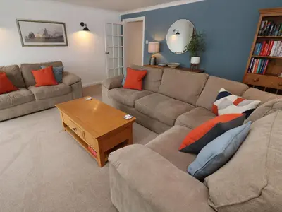 a living room with a couch and a coffee table at Rosemount in Marazion