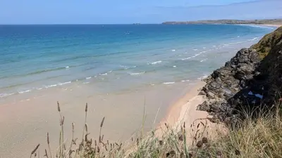 a beach with the ocean in the background at E28 HI-Up, Riviere Towans in Hayle