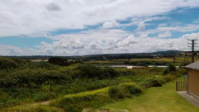 a view of a field with at E46 Dunroven, Riviere Towans in Hayle