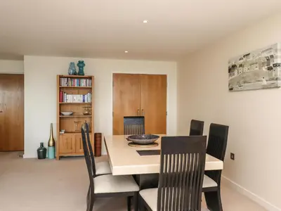 a dining room with a table and chairs at Ocean View in Carbis Bay