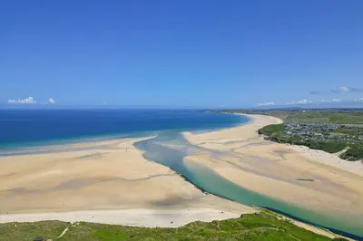an aerial view of a beach and the ocean at Sand Dunes 6 The Manor in St Ives