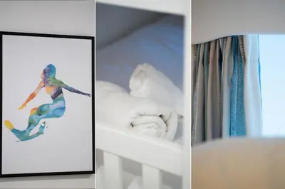 a picture of a woman on a snowboard in a room at The Lost Lobster in St Ives