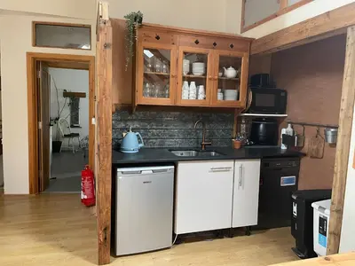 a kitchen with a sink and a counter top at Rosehip Barn in Launceston