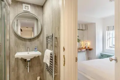 a bathroom with a sink and a mirror at 2 Bed in St. Ives oc-p00568 in St Ives