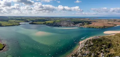 an aerial view of a bay with boats in the water at Finest Retreats - Sunny Nook in Padstow