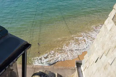 a view of the ocean from a balcony at Beach Vista, harbourside in St Ives in St Ives
