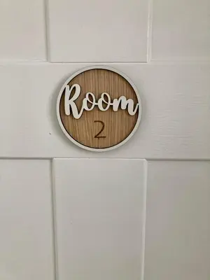 a wooden sign on a wall with the word room two at 8, St Marys , Private Double Ensuite Room - Room Only- Truro in Truro