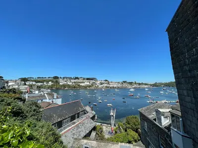 a view of a harbor with boats in the water at The Lugger Inn in Polruan
