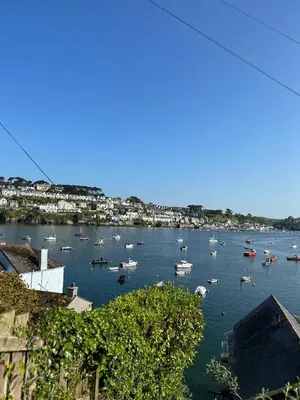 a view of a harbor with boats in the water at The Lugger Inn in Polruan