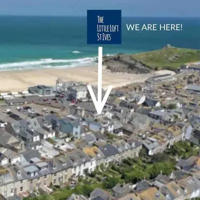 an aerial view of a beach with houses and the letter v at The Little Loft St Ives in St Ives