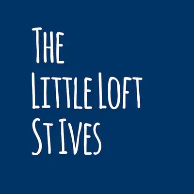 a sign with the words the little lot lashes at The Little Loft St Ives in St Ives