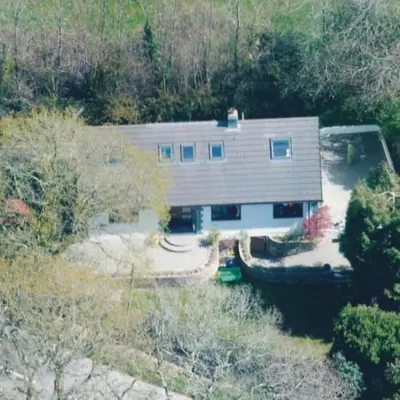 an aerial view of a house with a yard at Meadow Oak Accommodation in Bodmin